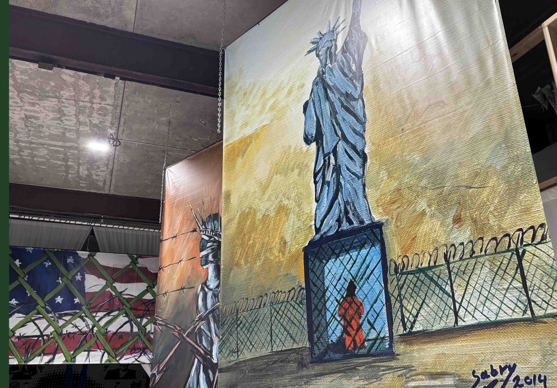 Professor Alexandra Moore’s Source Project stream culminated in the fall 2025 semester with a downtown Binghamton art installation centered on international human rights. It featured the work of an artist who first began to paint while imprisoned in Guantánamo, as well as a live conversation with three former Guantánamo detainees.