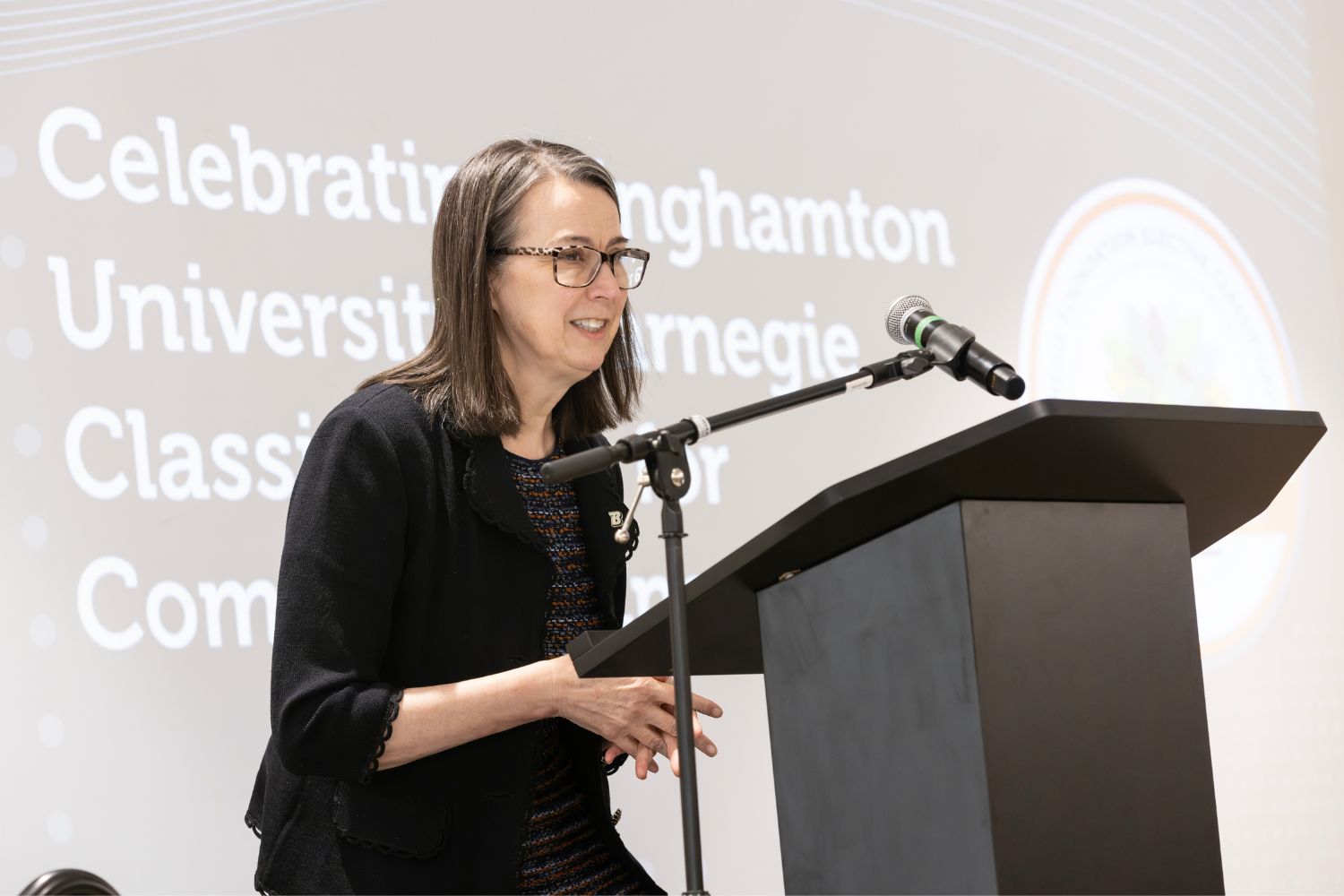 Binghamton University President Anne D'Alleva gives remarks during the university's Carnegie Elective Classification for Community Engagement celebration on March 2, 2026.