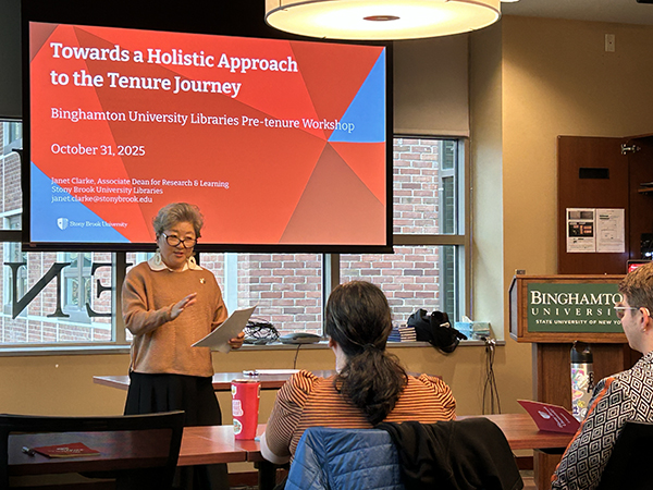 Janet Clarke, associate dean of research and engagement at Stony Brook University Libraries, gives a presentation to pre-tenure library faculty at the Binghamton University Alumni Center in Old O'Connor Hall.