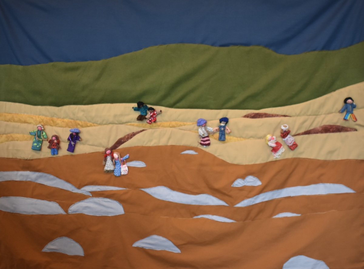 This quilt illustrates the heart-wrenching scene of families and communities uprooted by climate disasters – forced to abandon their homes, lands, and histories in search of safety and shelter. Each stitch captures a story of loss, resilience and the profound human cost of a rapidly warming world. The combined forces of sea level rise, intensified tropical storms, flooding, drought, wildfires, extreme heat and land desertification will make parts of the Earth unlivable. It is anticipated that millions of people will be displaced as a result of climate change. Some may be displaced by these impacts directly, while others may be forced to migrate due to political instability that can be triggered by rising food prices and resource shortages.