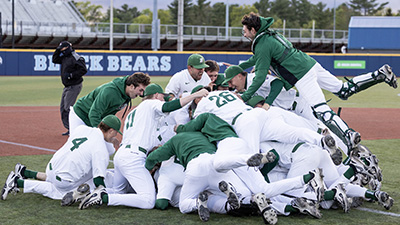 The Binghamton University baseball team celebrates after winning the 2025 America East Tournament.