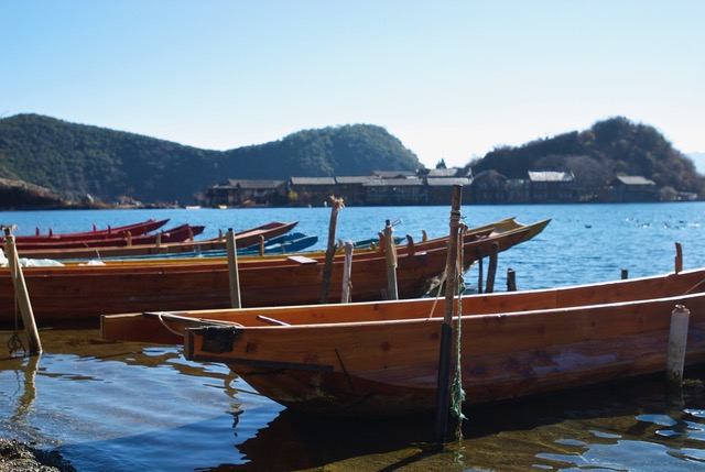 Boats outside a Mosuo community in China.