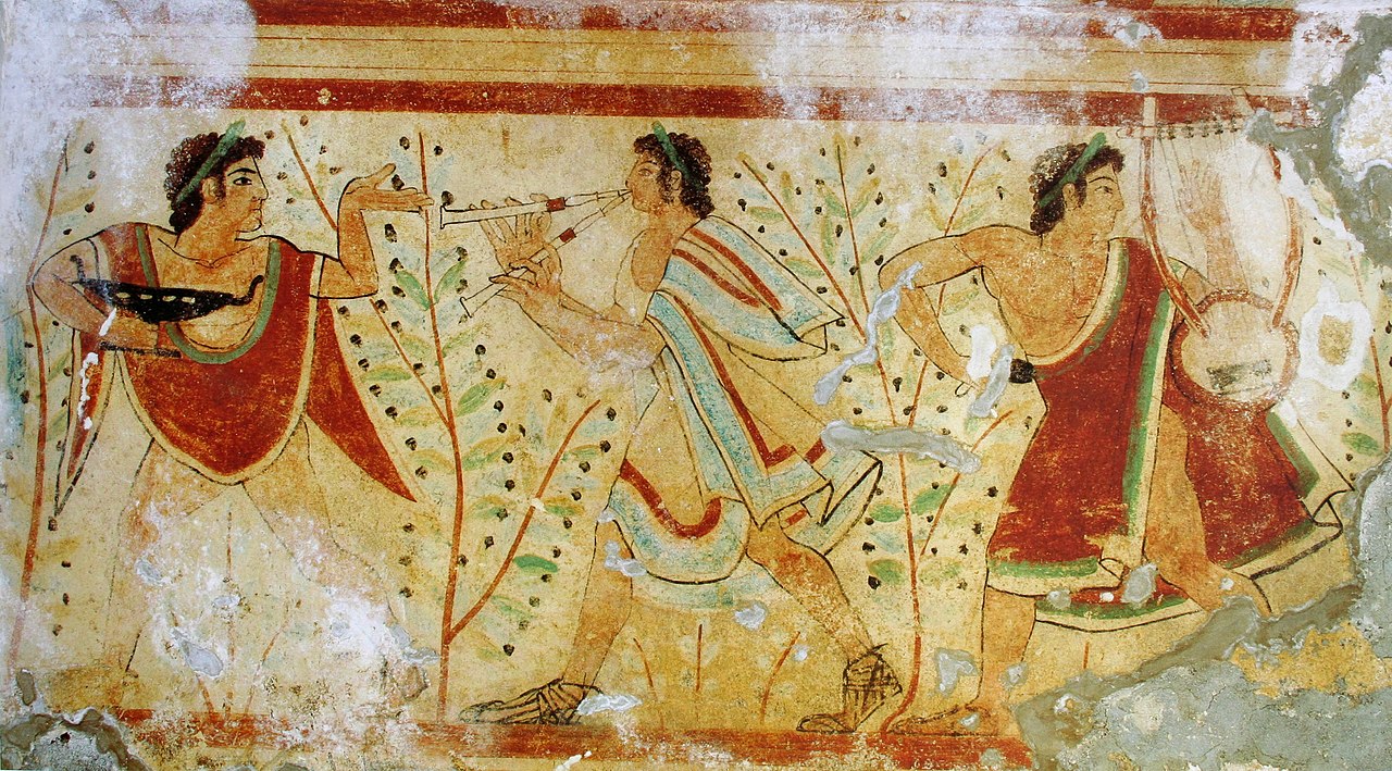 English: Dancers and musicians, tomb of the leopards, Monterozzi necropolis, Tarquinia, Italy. UNESCO World Heritage Site.