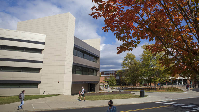 The refurbished Engineering Building surrounded by changing leaves in fall 2020.