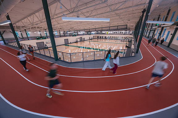 The East Gym addition includes an elevated indoor track and three new basketball/volleyball courts.