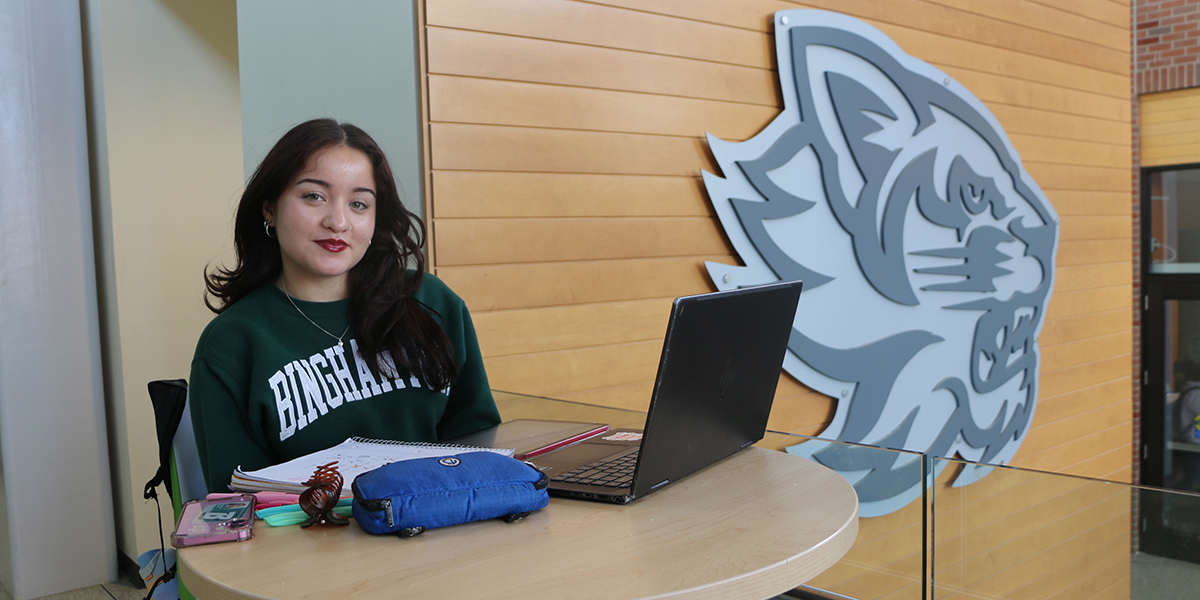 EOP student Britney Erazo studies in The Union, just outside the EOP Tutorial Center.