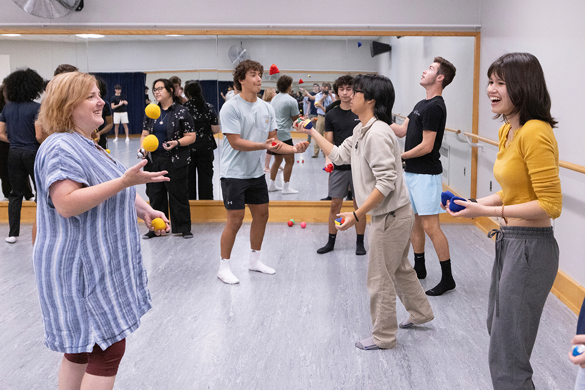 Jeanette Patterson, associate professor of romance languages and literatures, works with students in the Juggling: An Introduction. It is one of the First Year Experience courses offered in the fall 2023 semester.