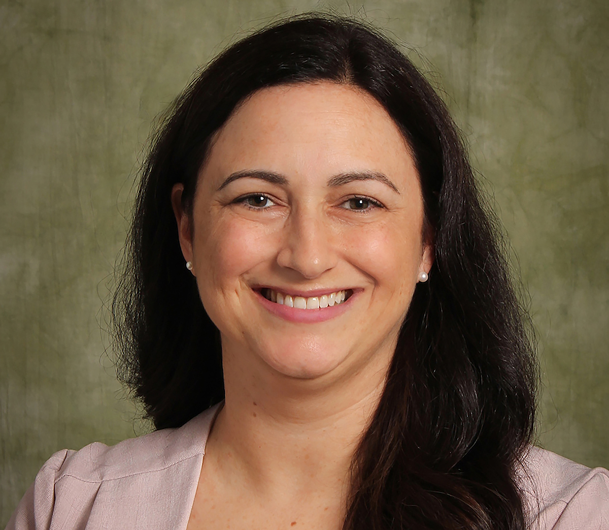 Andrea Falcone began her duties as dean of Libraries in July 2023.