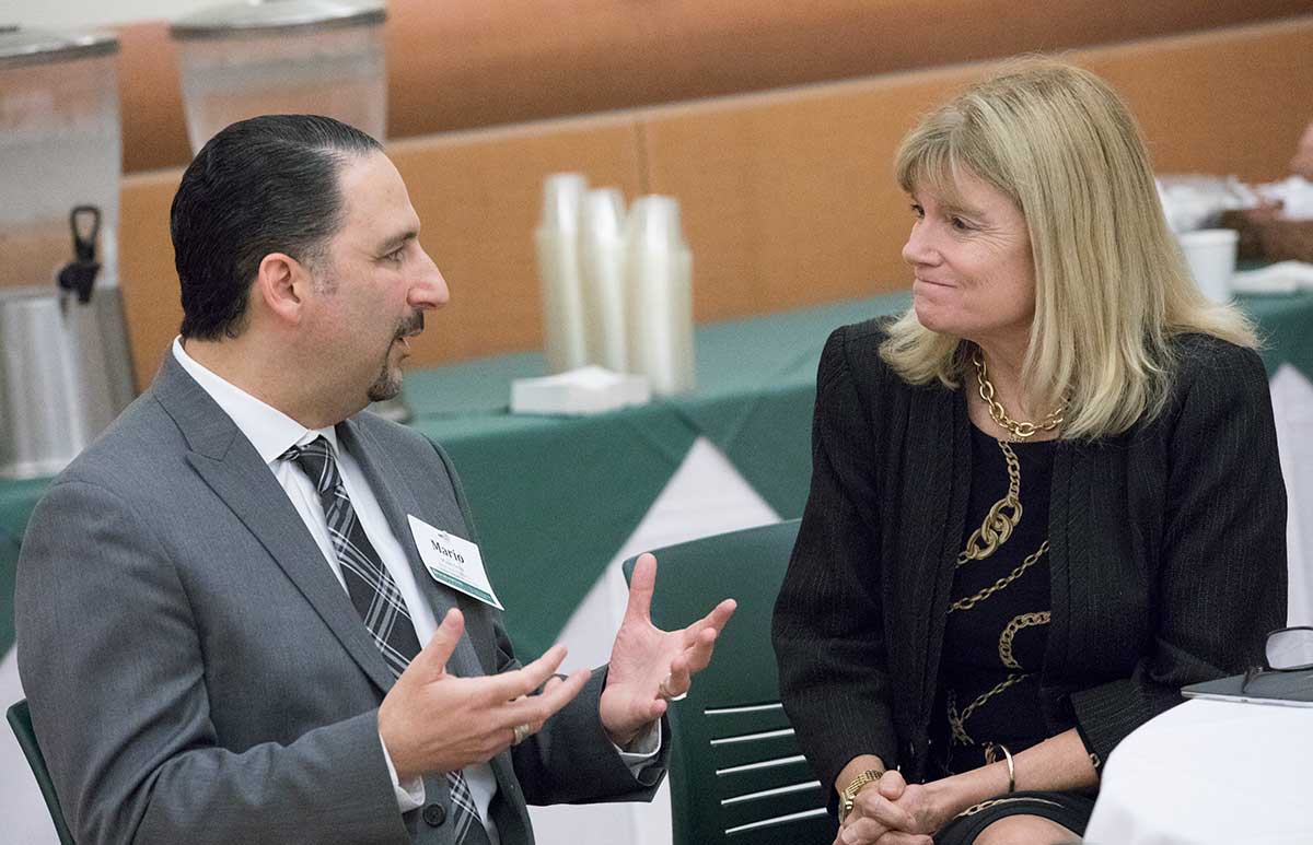 Mario Ortiz, dean of the Decker School of Nursing, discusses the need to improve care for the elderly with gerontology expert Terry Fulmer, keynote speaker at the first lecture presented by the school's Kresge Center for Nursing Research.