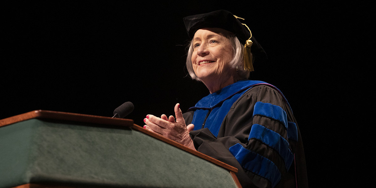 Founding Dean Gloria Meredith applauds the first class of graduates from the School of Pharmacy and Pharmaceutical Sciences.