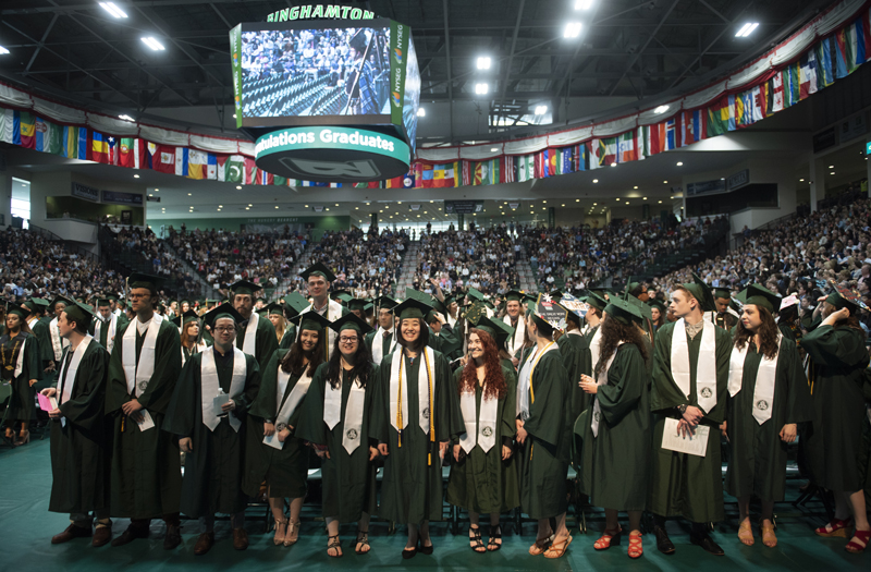 Harpur College students take part in the school's third Commencement ceremony at the Events Center on May 20.