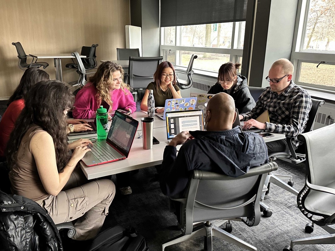 Students engage in small group work in English Professor Alexandra Moore’s Research in Human Rights class, part of the Source Project.