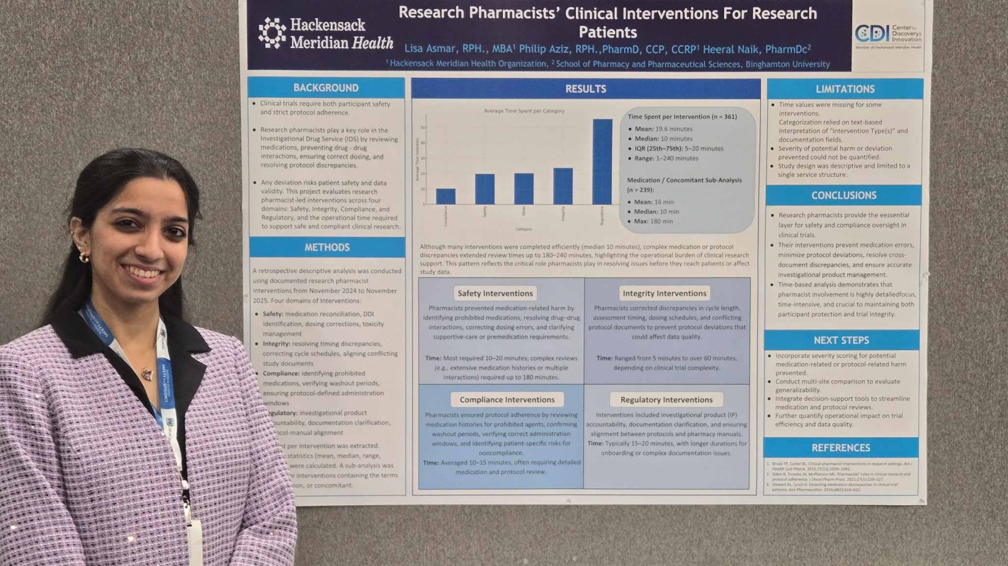 P4 Heeral Naik with her research poster 