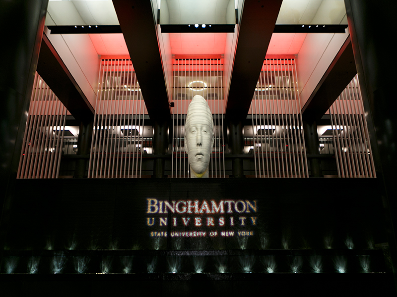 Binghamton University logo displayed prominently on a fountain in the lobby of the historic Grand Hyatt New York.