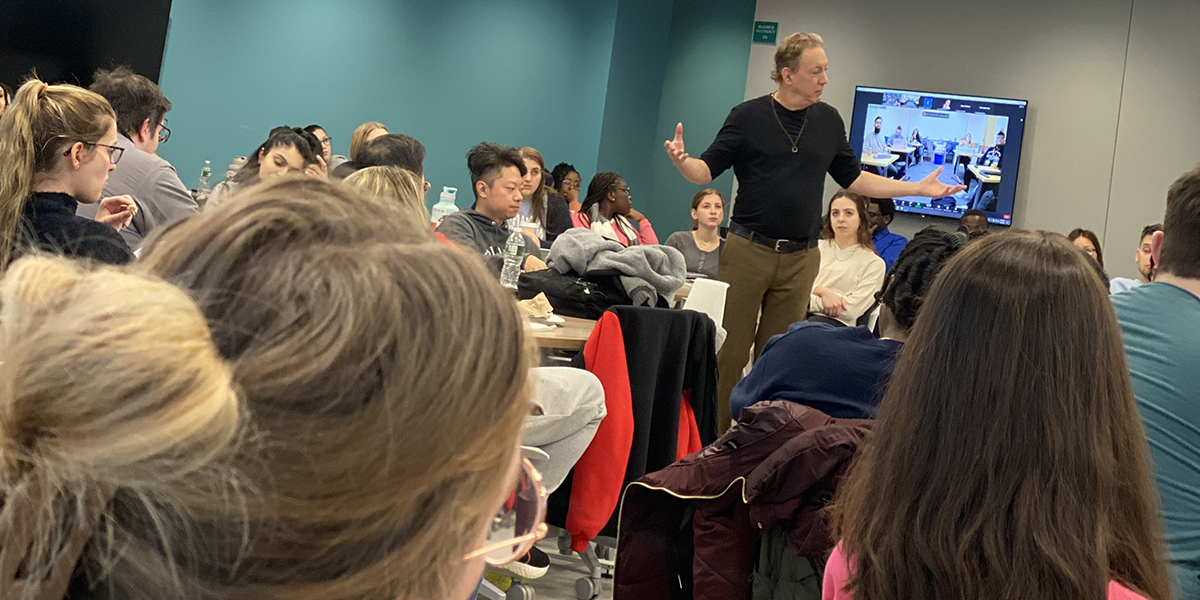 David Gonzalez, who bills himself as a poet, playwright, storyteller, musician, artivist and keynote speaker, helps PharmD students understand the value of developing empathy for others.