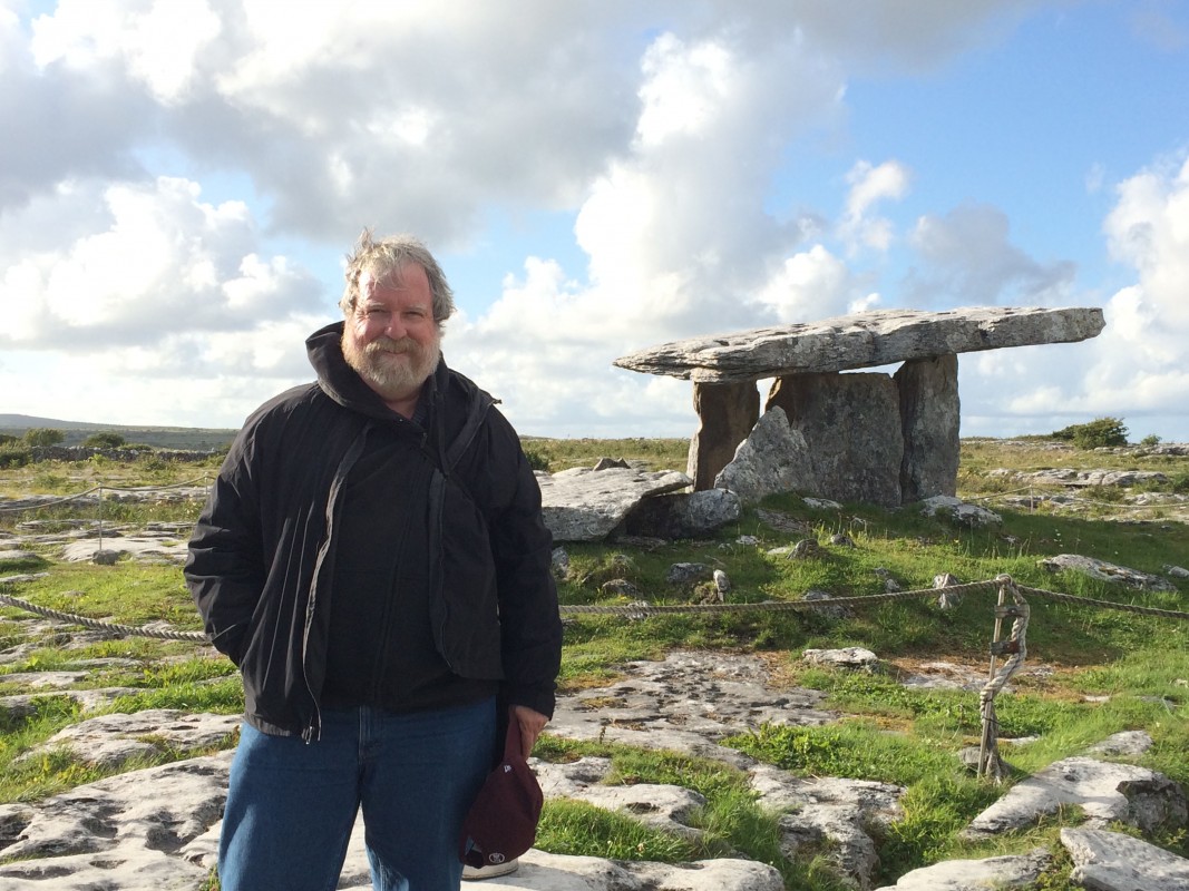 Anthropology Professor Thomas M. Wilson at a prehistoric dolmen monument in County Clare, Republic of Ireland.