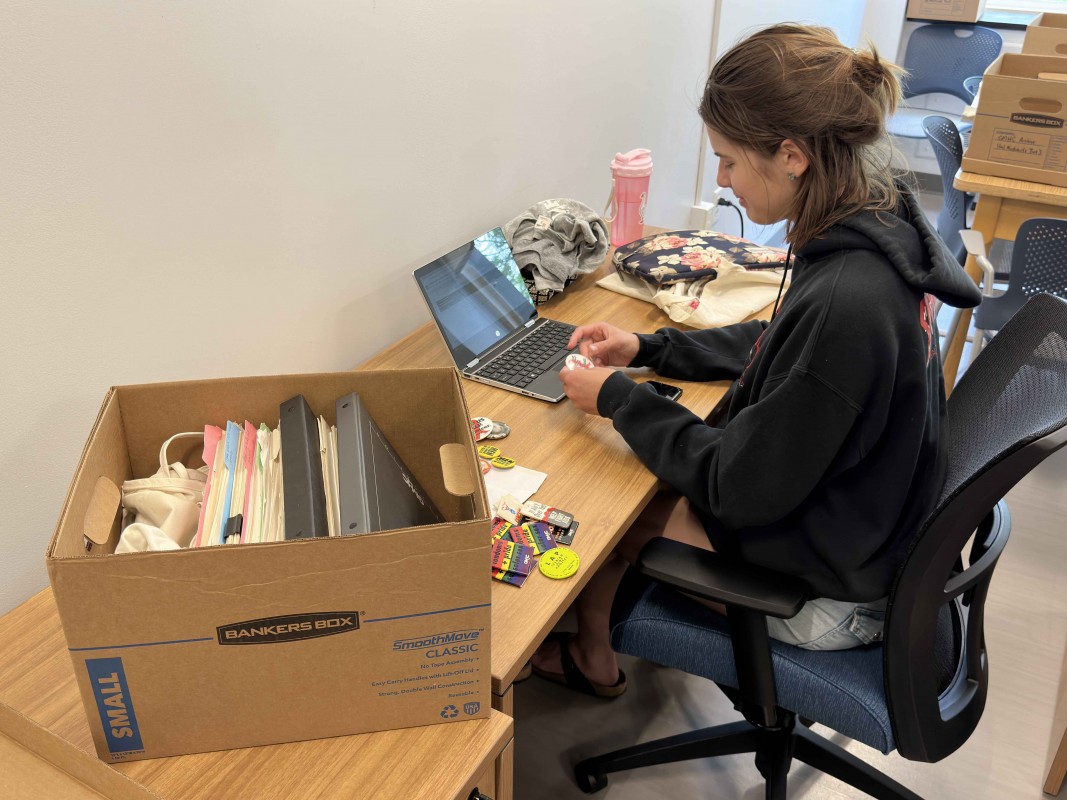 Claire Goldstein '24 catalogs materials associated with Gay Men’s Health Crisis (GMHC), the world’s first major HIV/AIDS service organization.