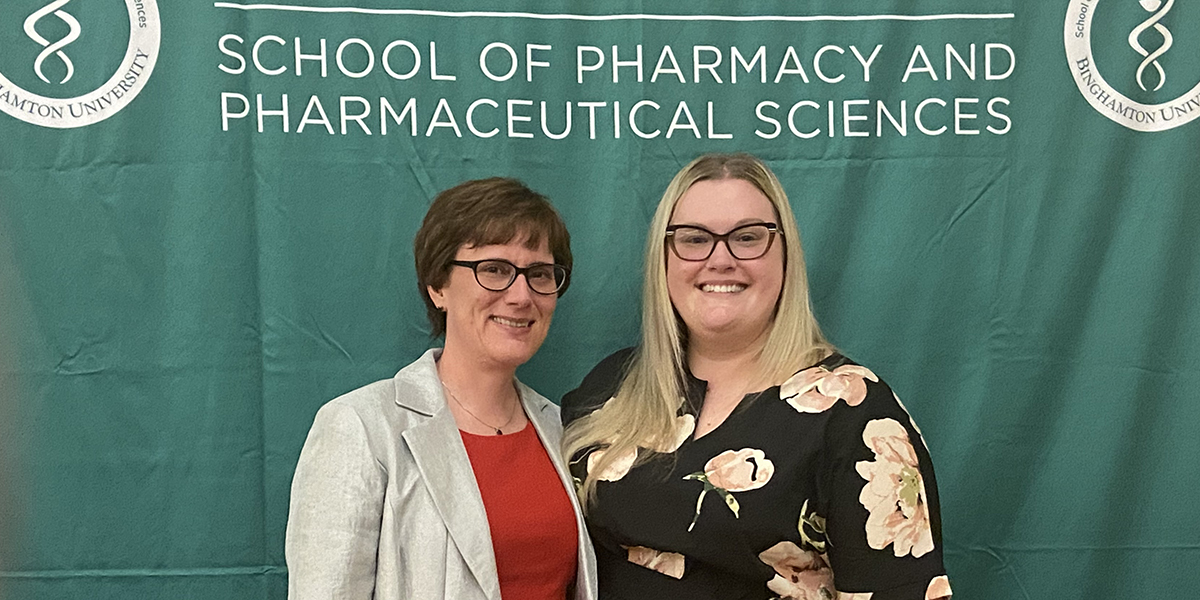 Aaron Beedle, associate professor of pharmaceutical sciences, left, and Emily Leppien, clinical assistant professor of pharmacy practice, were selected by students as teachers of the year for their respective departments. They were celebrated, along with many graduating Doctor of Pharmacy students, at an awards ceremony and banquet held May 10.