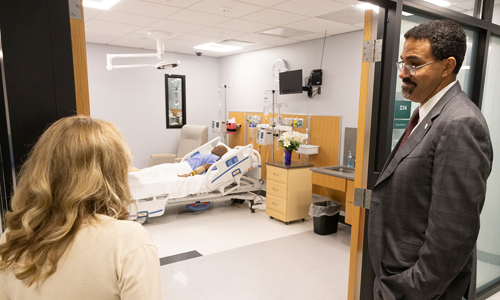 Chancellor King toured the Innovative Simulation and Practice Center during his visit. He is joined here by Patti Reuther, Decker College assistant dean of simulation and practice and Binghamton University director of interprofessional education.