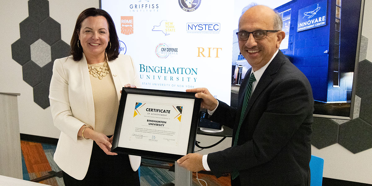Binghamton University and Griffiss Institute signed a Memorandum of Understanding on May 24 to collaborate on technical, professional, and disciplinary education. At the signing are Griffiss Institute President and CEO Heather Hage, left, and Watson College Dean Krishnaswami 
