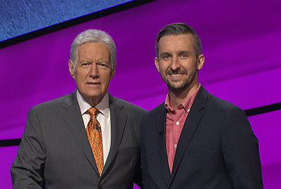 Kevin Boettcher with 'Jeopardy! host Alex Trebek.