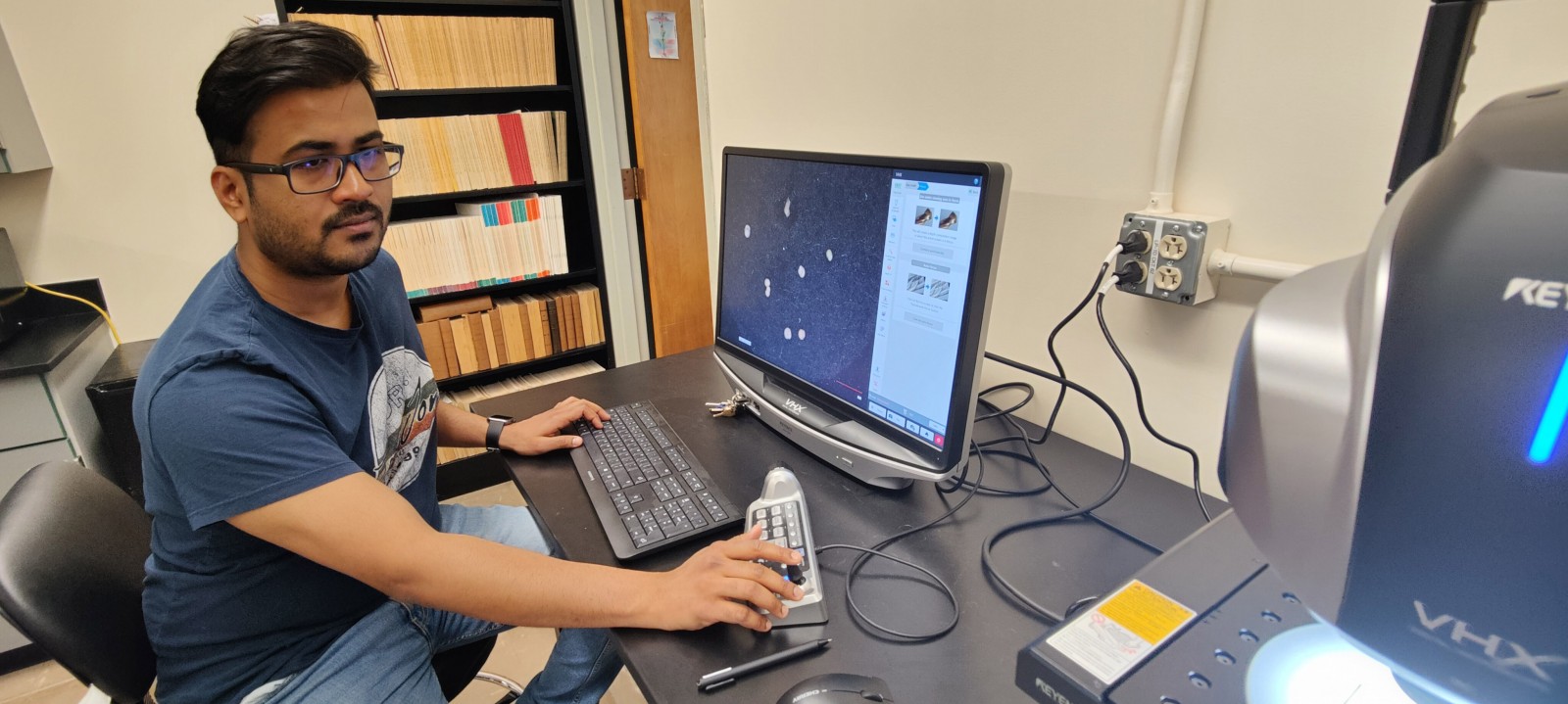 Doctoral candidate Ravi Kiran Koorapati works in a lab in Earth Sciences.