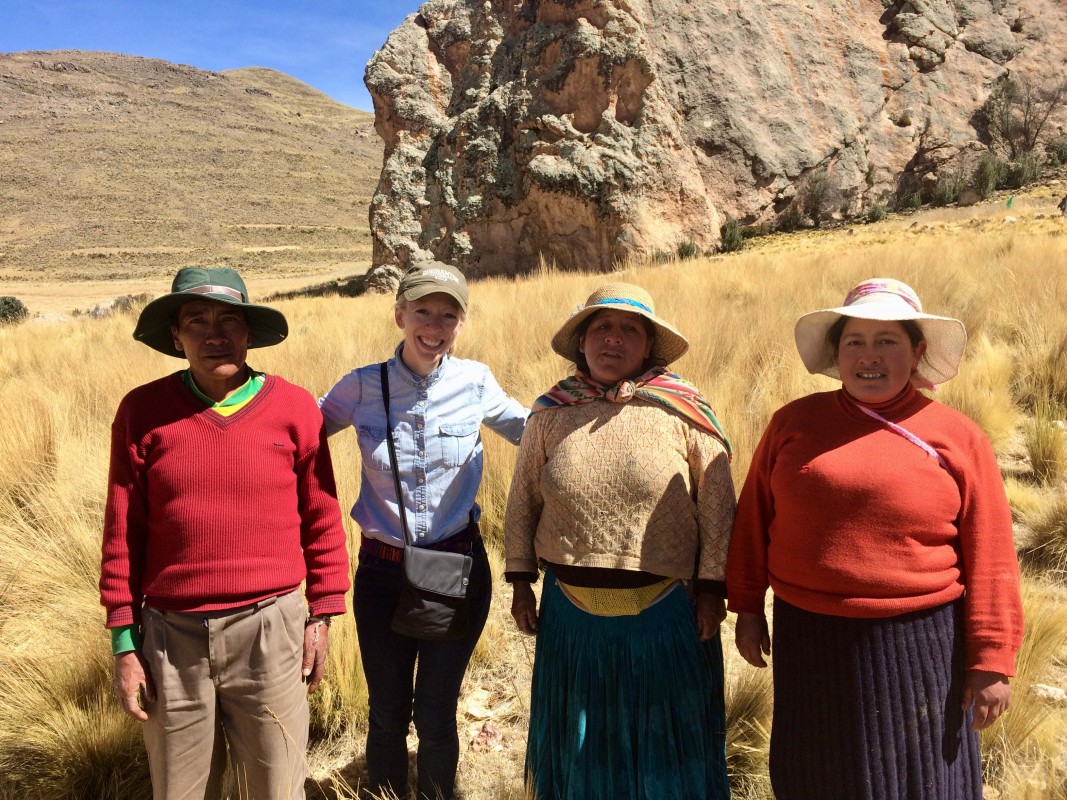 Binghamton University Associate Professor of Anthropology BrieAnna Langlie stands with Indigenous community members in Peru, where she is conducting research into ancient agricultural practices.