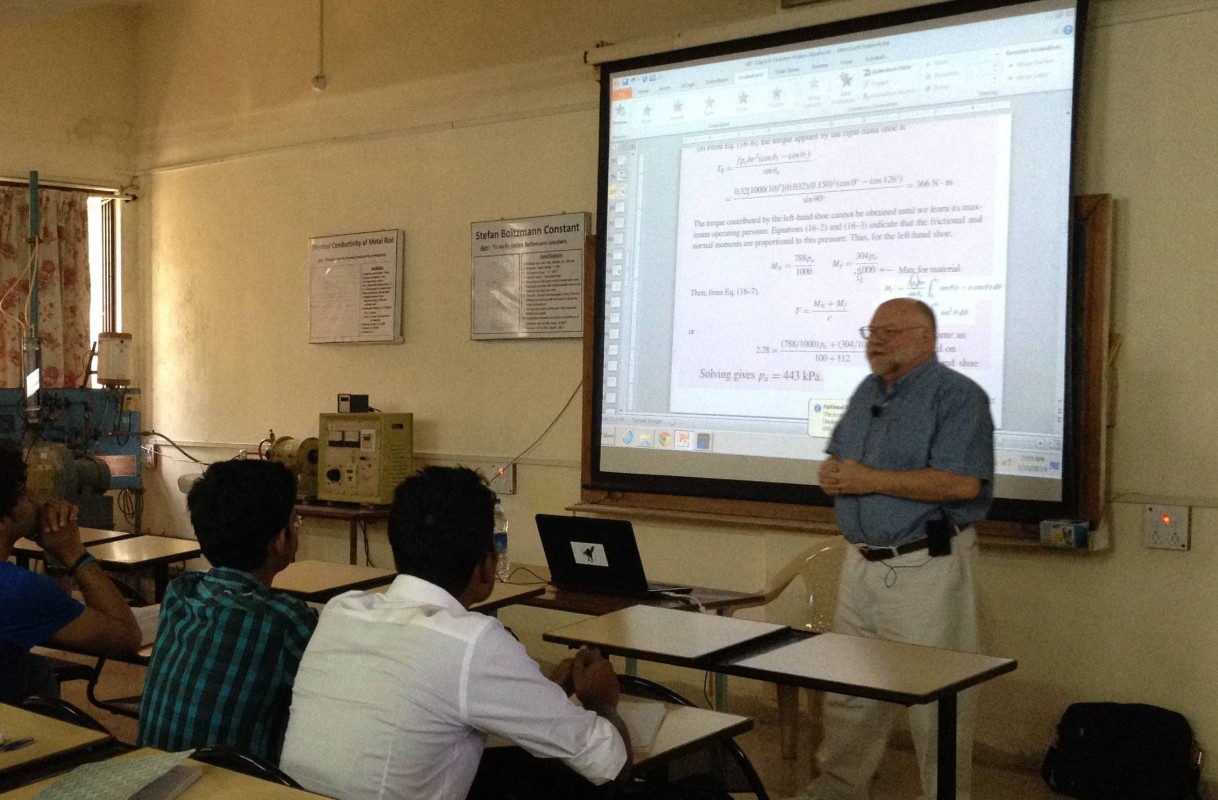 While working in Binghamton, Professor Roy McGrahon traveled abroad to teach.  Here he is giving a lecture in 2014 at the Velor Technology Institute in India.