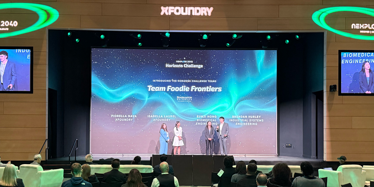 Eunji Hong and Brendan Hurley (right) are introduced at the xFoundry Horizons Challenge during the NEXPLORE 2040 Summit at Amazon headquarters in Arlington, Va., Sept. 9-11.