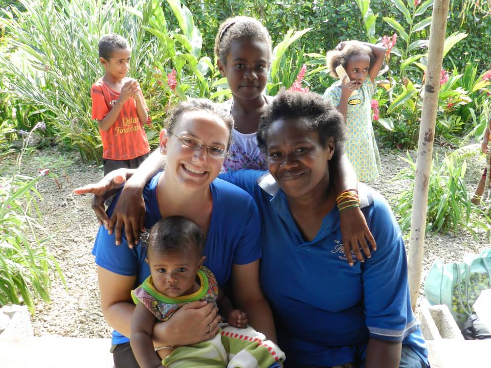 Binghamton University alumna Amanda Roome, left, doing field work in Vanuatu as a graduate student in anthropology.