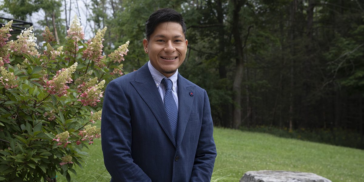 Manuel Sucuzhanay, shown here just prior to this White Coat Ceremony, is a new Doctor of Pharmacy student, will give back to his community after earning his degree.