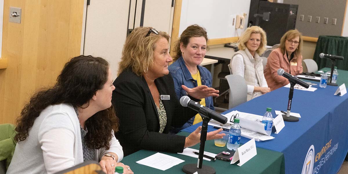 A panel discussion at the Binghamton University College of Community and Public Affairs focused on mental health issues students and teachers face in schools. From left, Tracy Lyman, a certified elementary and special education teacher and lecturer in the Department of Teaching, Learning and Educational Leadership, Rachel Murat, a Maine-Endwell High School teacher; Connie Buchinsky, a Calvin Coolidge Elementary School teacher; Lori Bass-Brown, a social worker at East Middle School in Binghamton; and Luann Kida, executive director for Binghamton University Community Schools and a former school social worker.