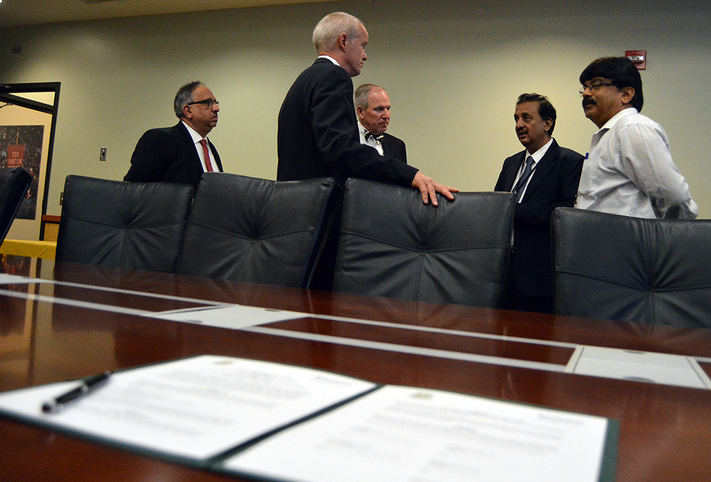 Binghamton University and P.E.S. College of Engineering officials meet before signing an MoA between the two schools.