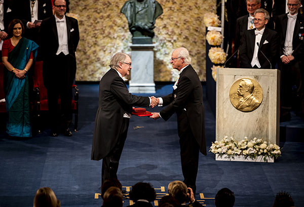 M. Stanley Whittingham receives his Nobel Prize in chemistry from King Carl XVI of Sweden.