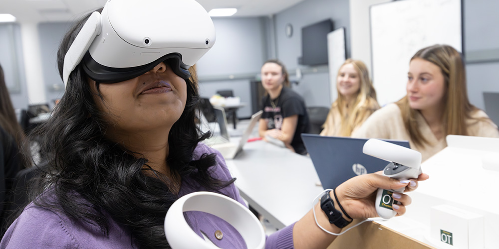 Occupational therapy faculty use VR in the classroom to help students understand what they can't see. They emphasize that it complements, rather than replaces, other methodologies.