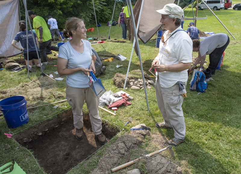 PAF Director Laurie Miroff, left, talks with her former director Nina Versaggi at a site in Whitney Point, N.Y.
