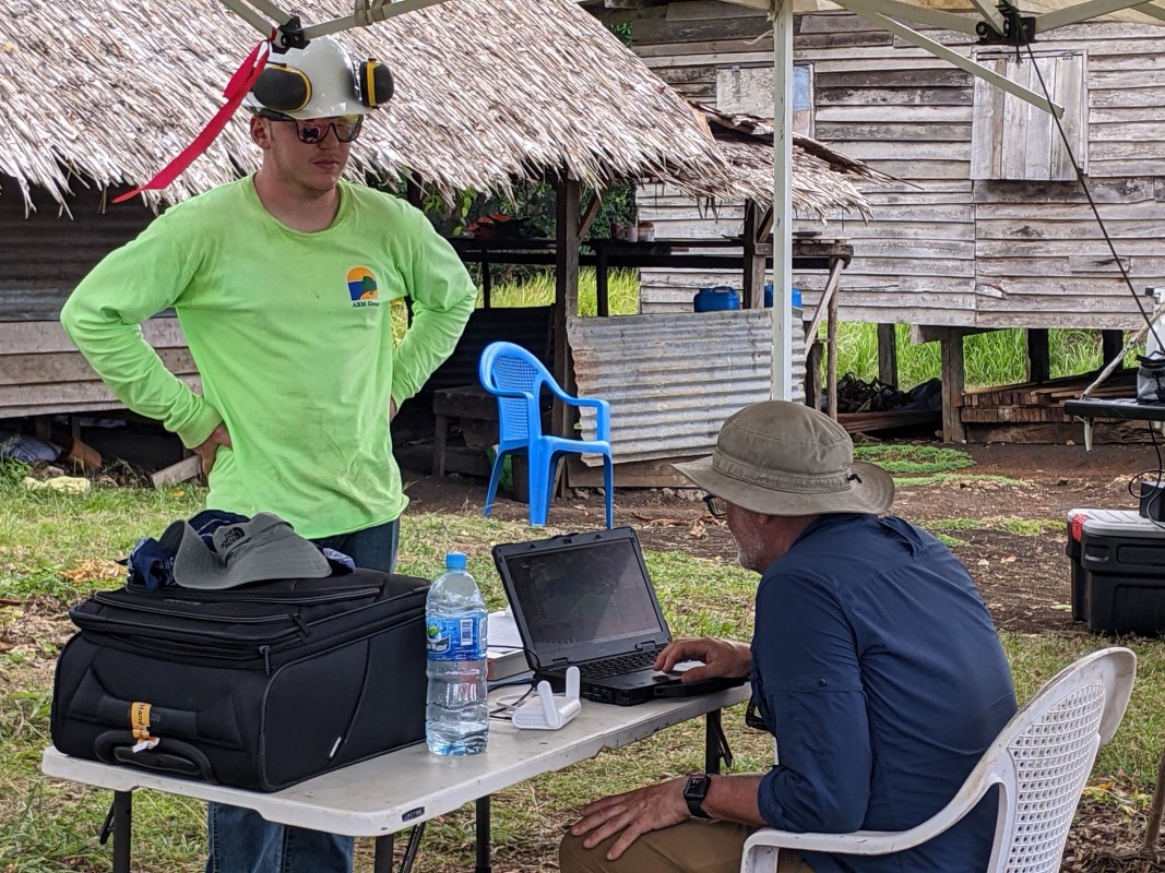 Associate Professor of Geography Thomas Pingel (right) and geological sciences master’s student Colin Mulhern (left) coordinate drone-based research in the Solomon Islands.