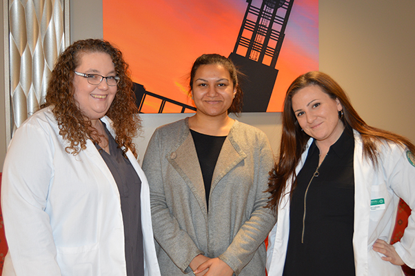 PharmD students Elizabeth Laughlin, left, and Alicia Letizio, right, recently attended their first-ever statewide conference. Sara Spencer, IPPE coordinator and clinical instructor of pharmacy practice at the SOPPS, center, also attended.