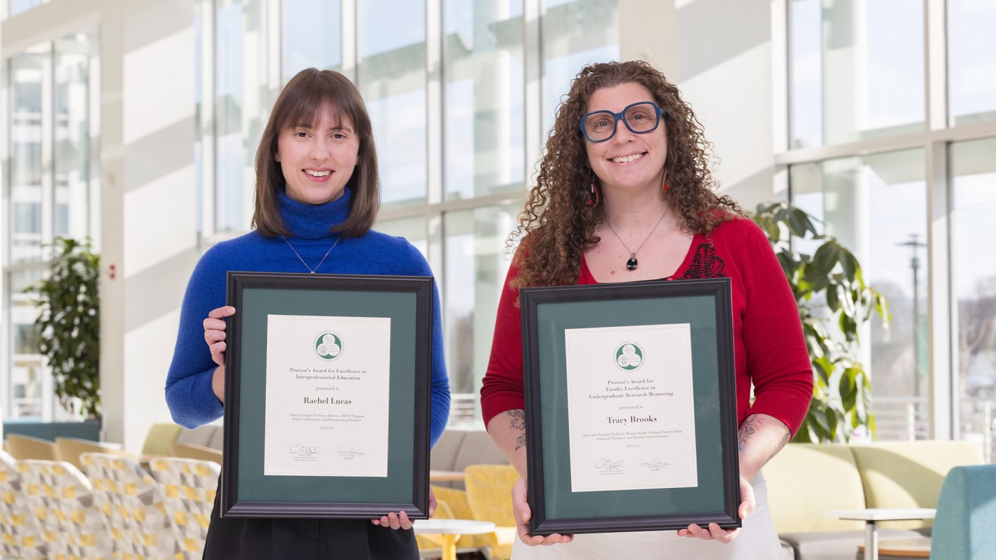 Clinical Assistant Professor Rachel Lucas (left) and Associate Professor Tracy Brooks (right) with the Provost Award for Interprofessional Education and Undergraduate Mentoring, respectively.