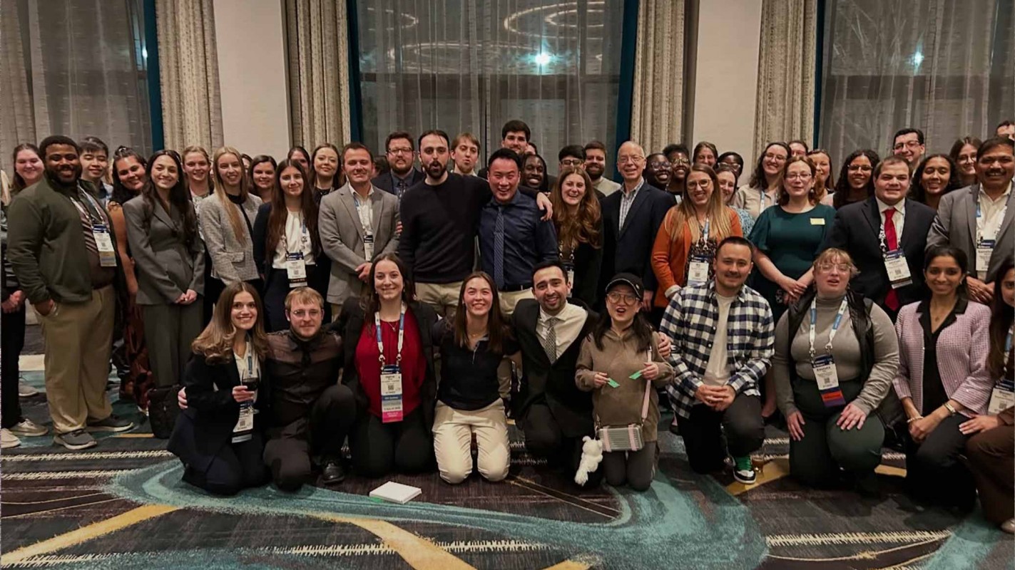 SOPPS Faculty, preceptors, alumni and students all pose for a big group photo together at the 2025 ASHP Midyear Clinical Event and Exhibition.