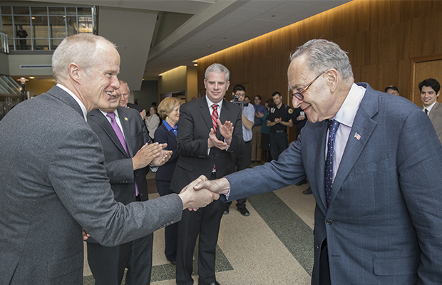 Binghamton University President Harvey Stenger welcomes U.S. Sen. Charles 