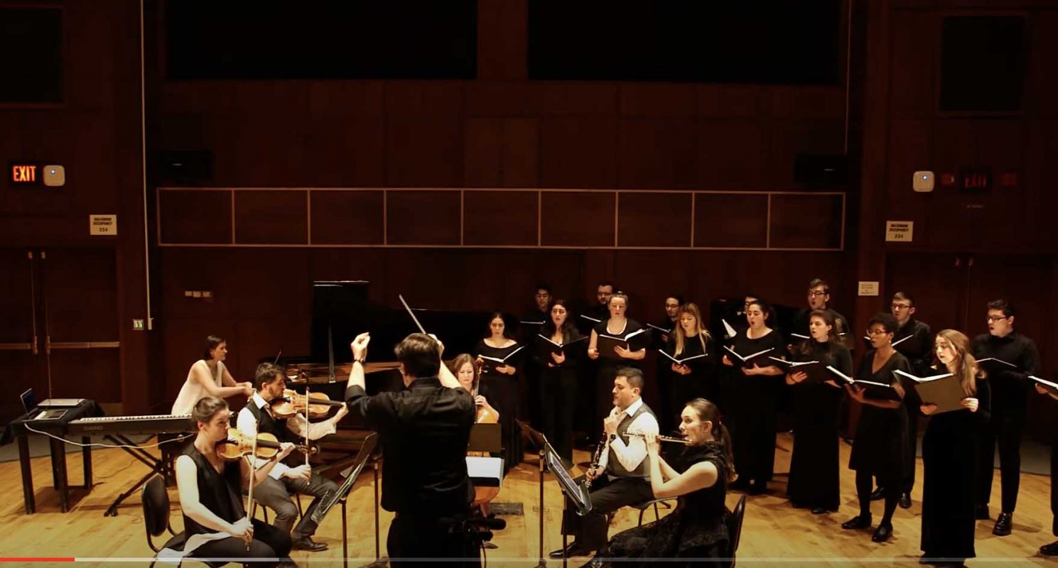 The Fifth House Ensemble and the Binghamton University Chamber Singers, directed by William Culverhouse, perform 