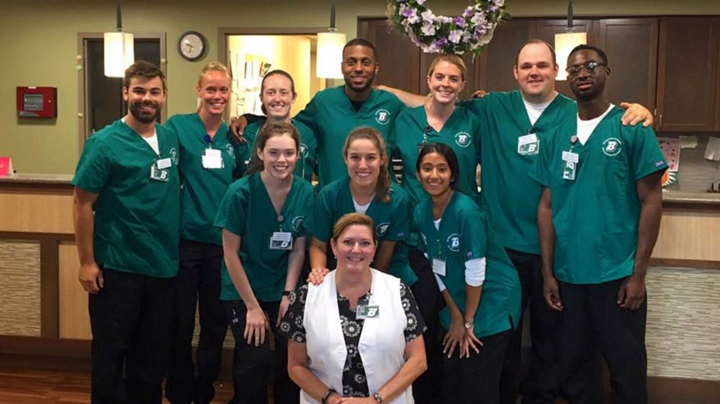 Gabrael Sindoni (second from the right) with his first clinical nursing group and Clinical Assistant Professor Alma Rood (front center).