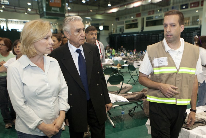 Dave Hubeny, right, leads U.S. Sen. Kirsten Gillibrand and then-U.S. Representative Maurice Hinchey through the Events Center following the 2011 flood, when the facility was serving as the largest Red Cross shelter in the Northeast.