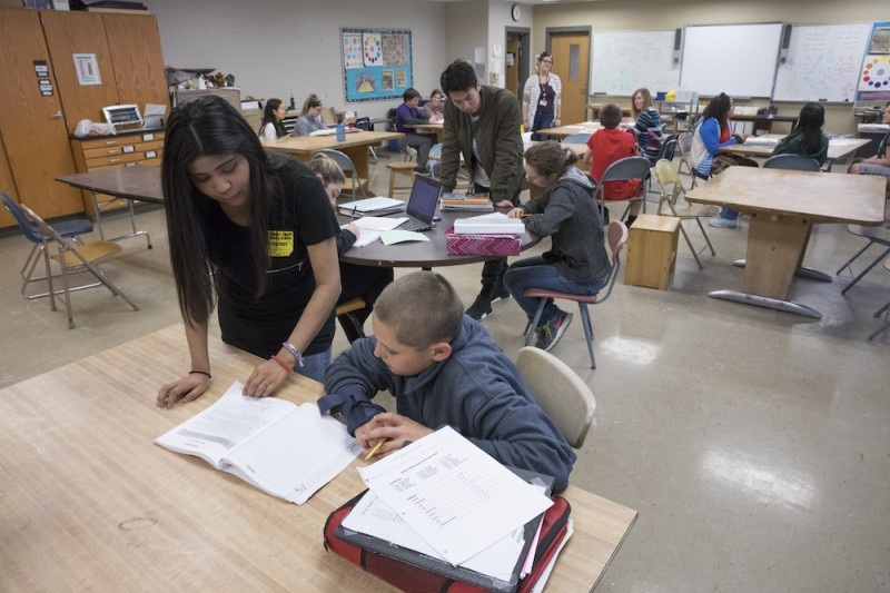 Binghamton University students tutor middle school students at Jennie F. Snapp Middle School in Endicott, which is part of the Promise Zone initiative, May 2, 2017.