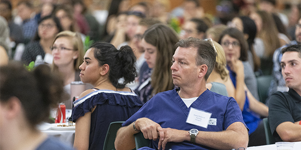 Students from the School of Pharmacy and Pharmaceutical Sciences, the Decker School of Nursing and the College of Community and Public affairs (pharmacy, nursing and social work, respectively) gathered in their interprofessional teams for orientation in August.