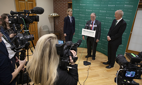 Distinguished Professor M. Stanley Whittingham, flanked by SUNY Chancellor Kristina Johnson and Binghamton University President Harvey Stenger, responds to media questions prior to the ceremony and reception honoring him for winning the Nobel Prize in Chemistry.