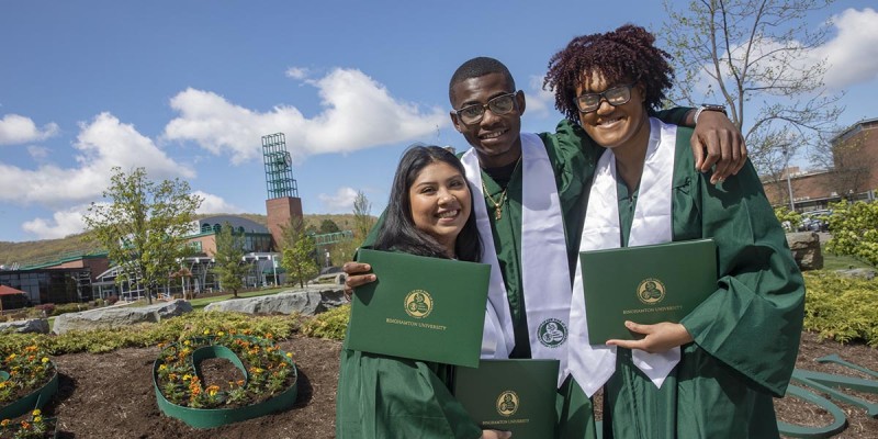 Class of 2021 members took photos at the berm to celebrate graduation.