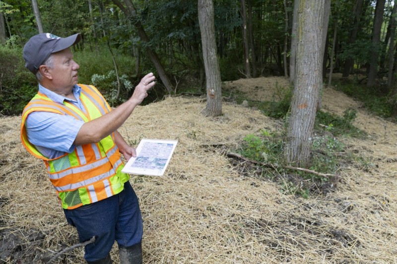 Joe Graney, (pictured here), professor of geological sciences and environmental studies and the associate director of the Center for Integrated Watershed Studies, gives a tour to show the progress of the restoration of the erosional channel at Nuthatch Hollow, Friday, September 17, 2021.