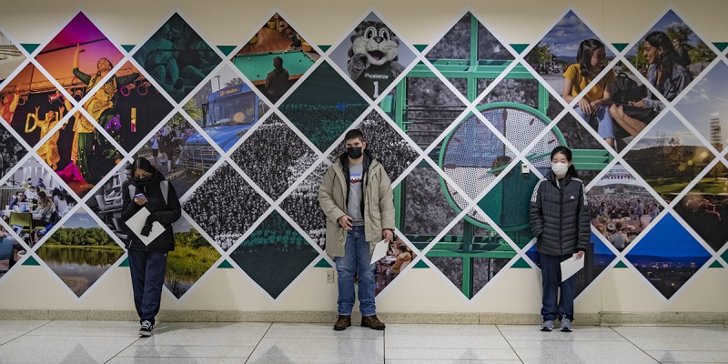 Students wait for results of their COVID tests before checking in with Residential Life during the spring 2022 semester move in.